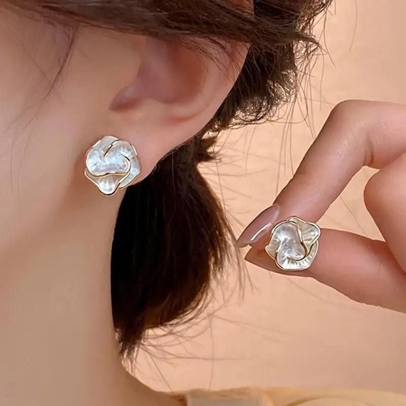 Brincos vintage com óleo roxo  - Pearl Earring Stud avaliação e preço